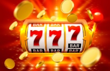 A close-up image of a 3 barrel slot reel with lucky 7 symbols